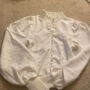 Asymmetrical hem crop blouse